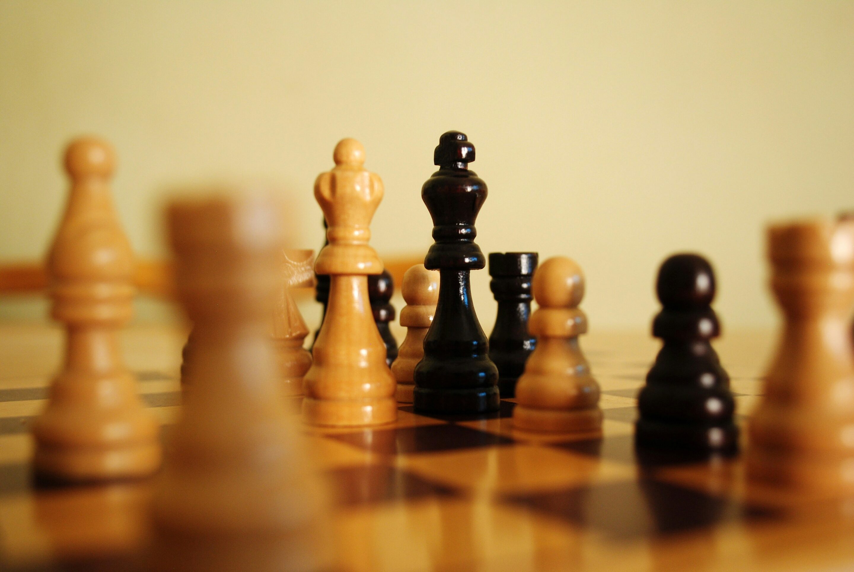 Chess pieces arranged on a board representing strategic decision‑making in observability and performance engineering.